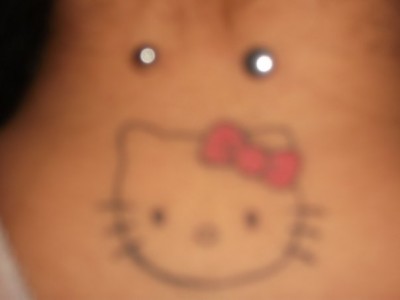 Hello Kitty neck tattoo Hello Kitty neck tattoo