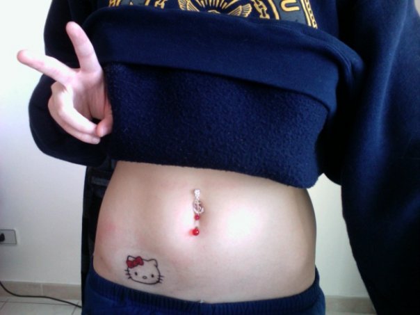 tattoos on waist. Hello Kitty Tattoo