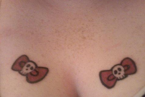 pink bow tattoos. These are my Skull ow tattoos