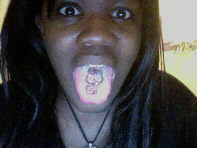  it's also important for her to exist as a Hello Kitty tongue tattoo: