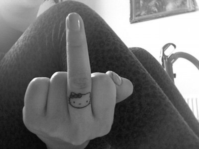Tattoos On Inside Of Finger. Hello Kitty Finger Tattoo: