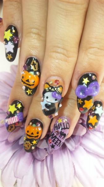 hello kitty halloween nails black cat Hello Kitty black cat and pumpkin Halloween finger nail art
