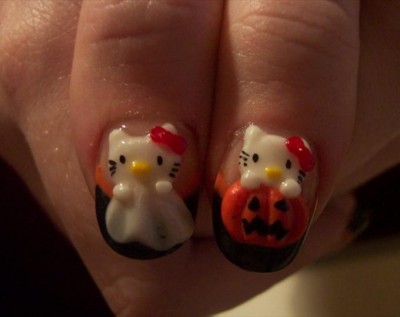hello kitty halloween nails Hello Kitty ghost and pumpkin nails