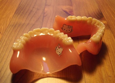 hello kitty dentures Hello Kitty fake teeth dentures false tooth