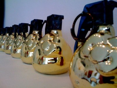 hello kitty handgrenades gold a line of gold Hello Kitty hand grenades