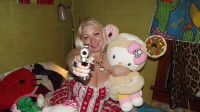 hello kitty guns and plush Hello Kitty fanatic with a gun